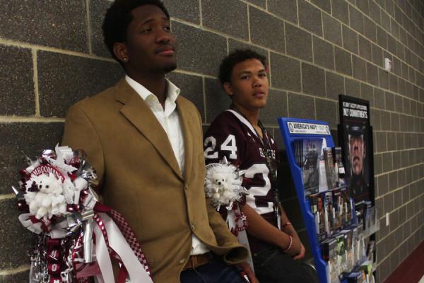 Juniors Jamir Carr and George Haskins wears their garters on Homecoming day.