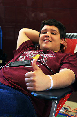 Brandon Matlock donating blood, with a great attitude. 

