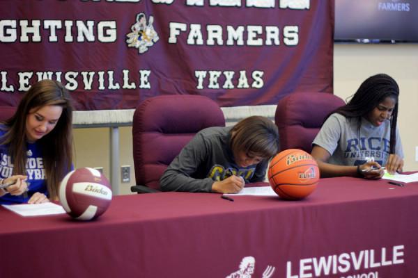 Kristyn Nicholson (left), Monisha Neal (center) and Portia Okafor (right) sign their letters of intent.