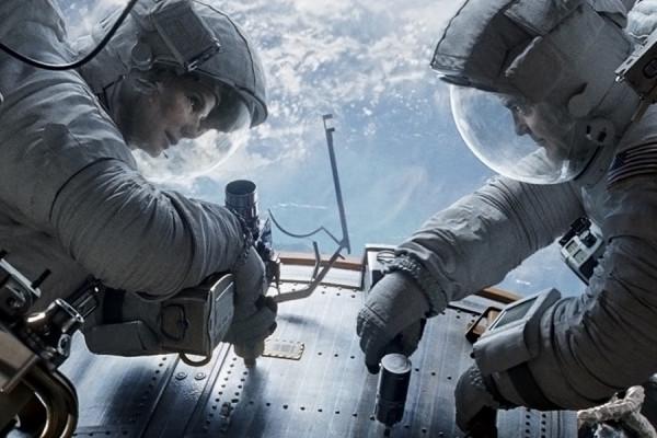 Sandra Bullock (Left) and George Clooney (Right) play as astronauts fixing a space shuttle. As they enjoy the amazing view of earth, theyre not prepared for the ineveitable doom that approaches.   