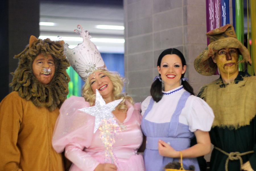 David True, Donna Latson, Jessica True, and Chuck Andrews dress as the characters from The Wizard of Oz at the  Grand Ball on March 29.