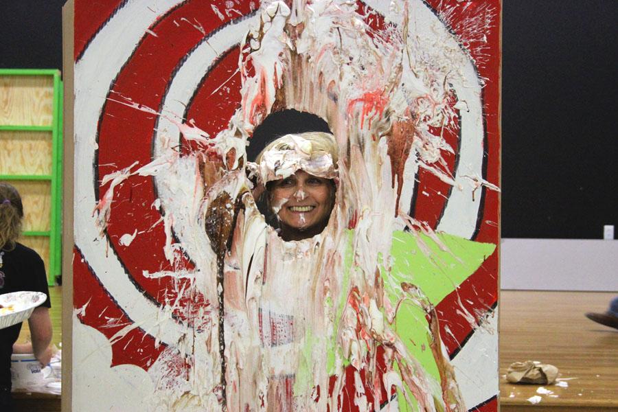 History teacher Bessie Alexander awaits a pie in the face on May 22. 