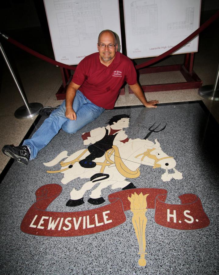 Darren Ryan poses with the Big John mascot in the lobby on the last day of school in the old building.