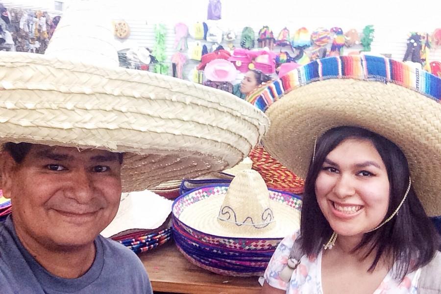 John Guerrero poses with his daughter Jackie at a gift shop in San Antonio during a family vacation this summer.
