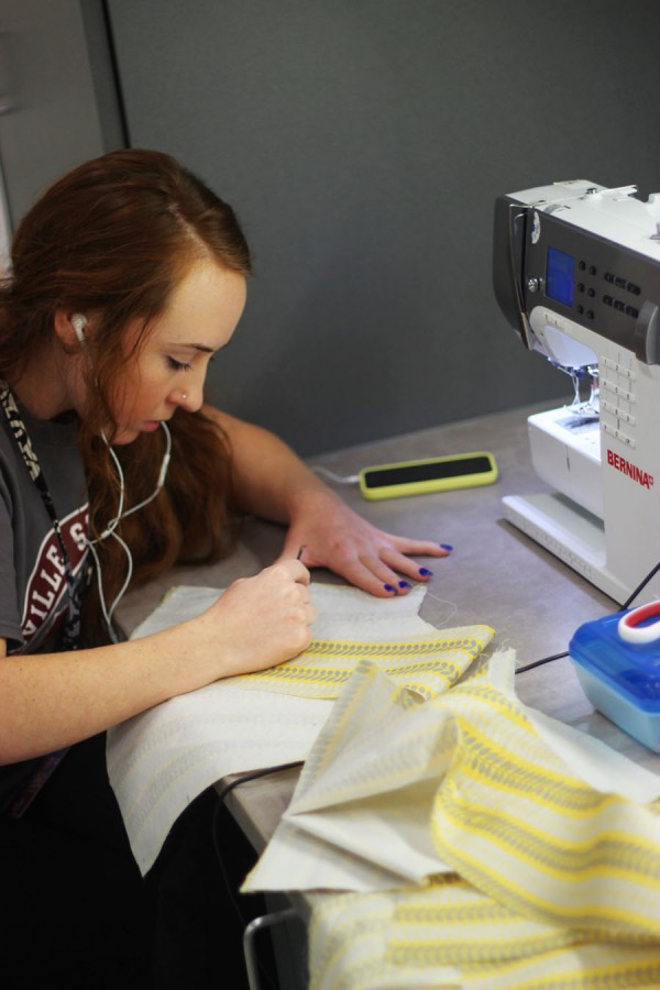 Senior Madison Bloodworth while sewing together a handbag. Perfecting it get really complicated and wrong measurements can make you start over. says Madison.