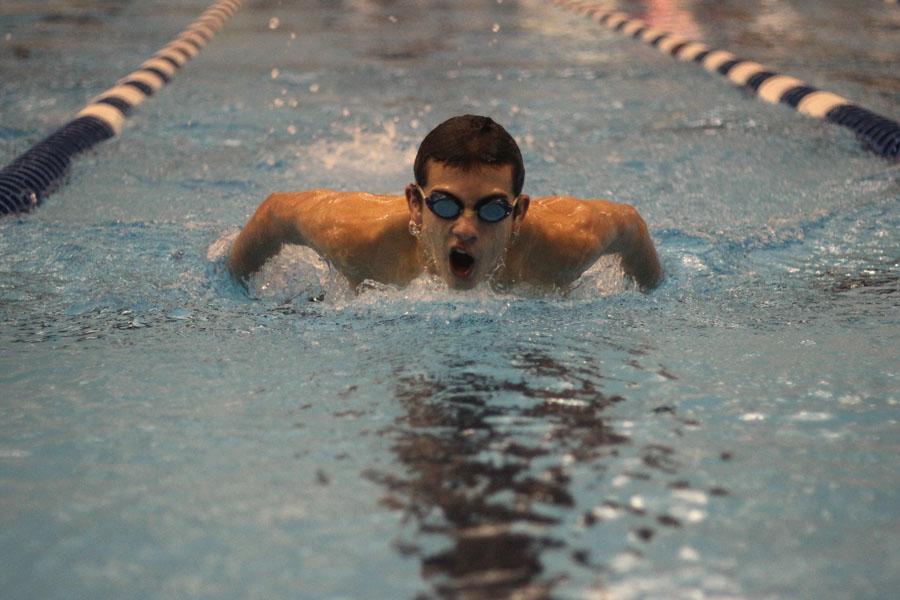 Sophomore Charlie Estrada competes in the butterfly on Dec. 4 against Richardson.