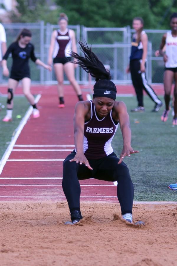 Senior Kariyah Lanehart during the long jump at the Track and Field Meet at Marcus on April 9.