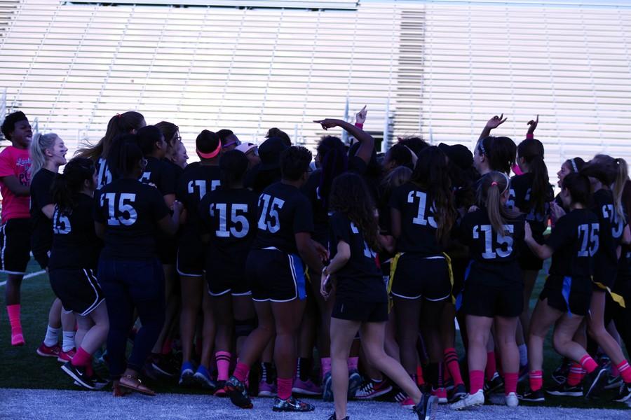 Seniors rile each other up for the Powderpuff game on April 20.