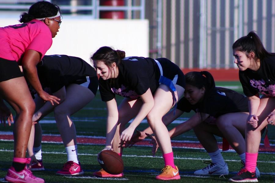 Alex Shumway gets ready to hike the ball at the April 20 Powderpuff game.