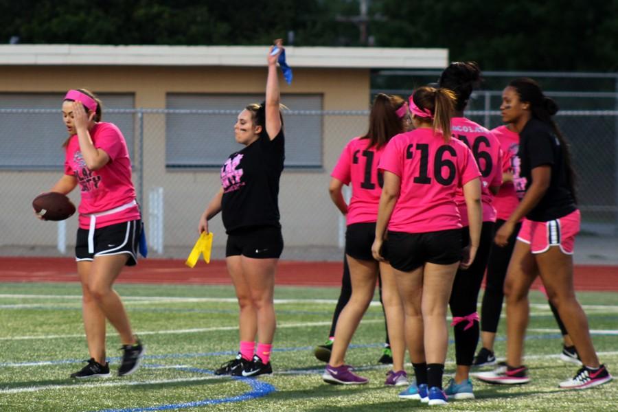 Morgan Rose captures the flag during the Powderpuff game on April 20.