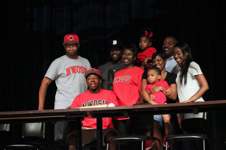 Dash Johnson poses with family after signing to NorthWestern Oklahoma State.