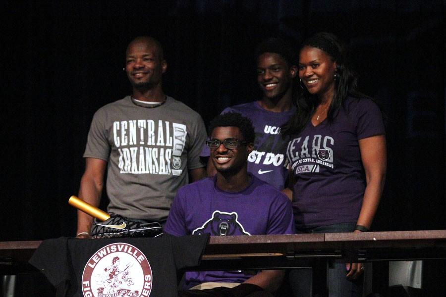 Runner Jeriah Johnson poses for a picture after signing to Central Arkansas University.