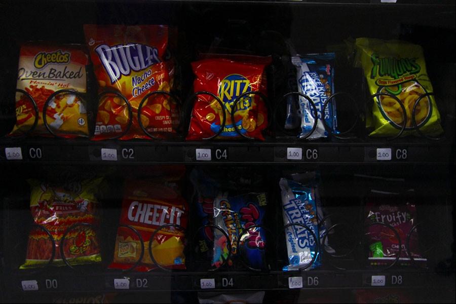 Vending+machines+throughout+the+school+are+filled+with+unhealthy+snacks.