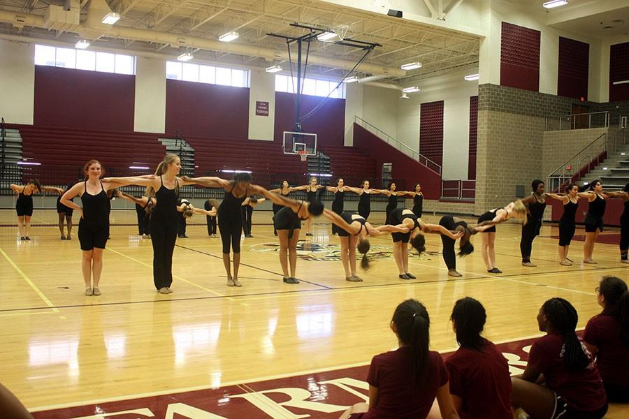 The Farmerettes practice their routine for the holiday show. 