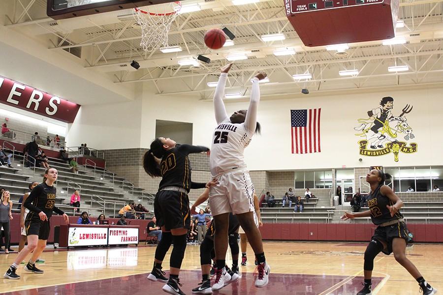 Senior Alexia Passmore (25) jumps for a shot on February 2 against Plano East.