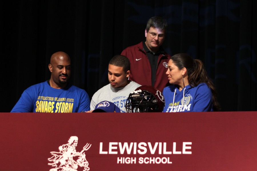 Senior Kobe Neal signs to the Southeastern Oklahoma State to play football as a freshman in college. 
