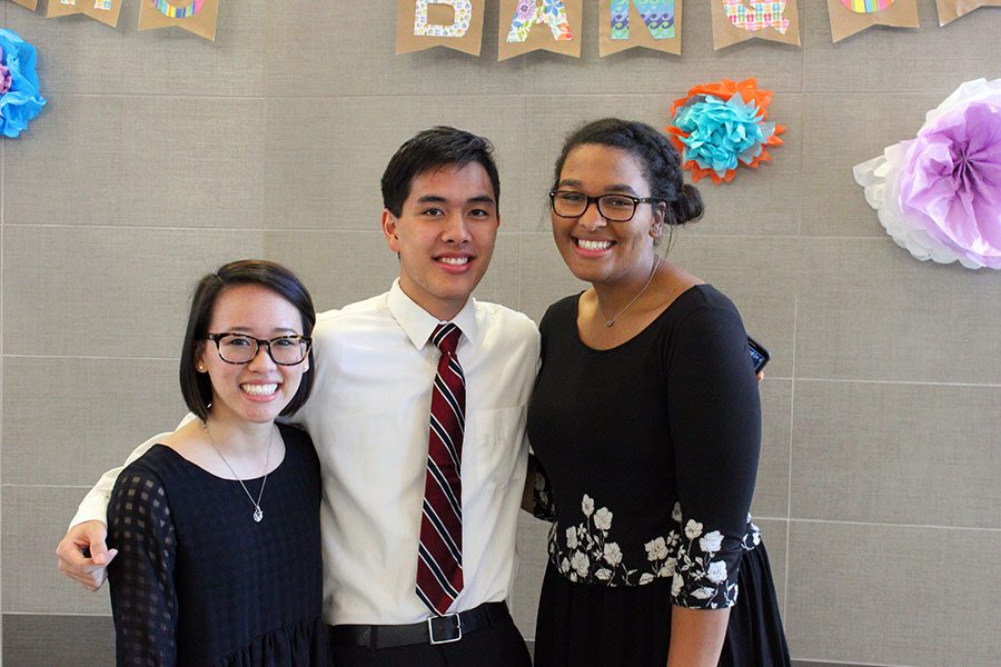 Juniors Madison Lam, Nathan Hoang, and Miriam Fisher pose as new senior officers.