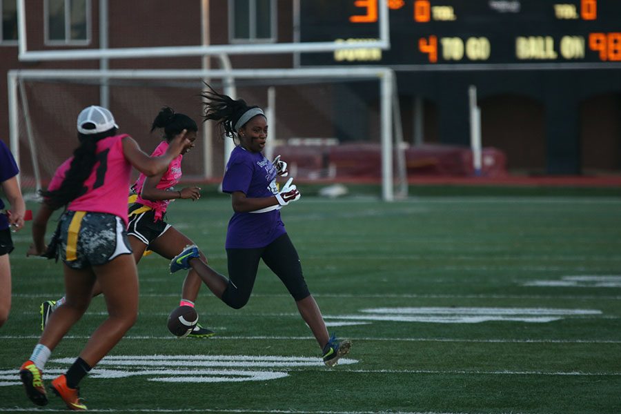 Senior Jaida Johnson drops the ball while trying to escape from the junior players. 