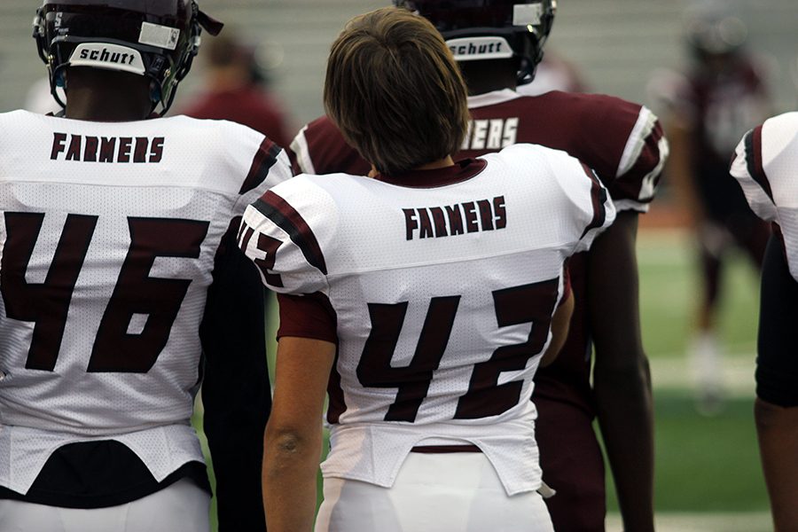 #46 David Whinfrey and best friend #42 Tyler Cortez watching from the sidelines of the spring game.