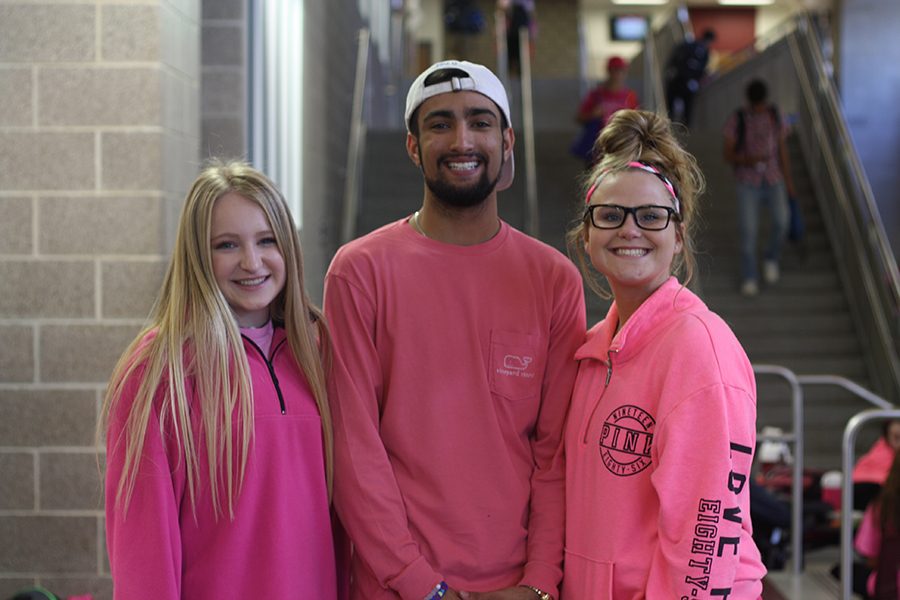 Seniors Bailey Payne, Buraq Hamid and Grace Wilson showing their school spirit on Pink Out day.