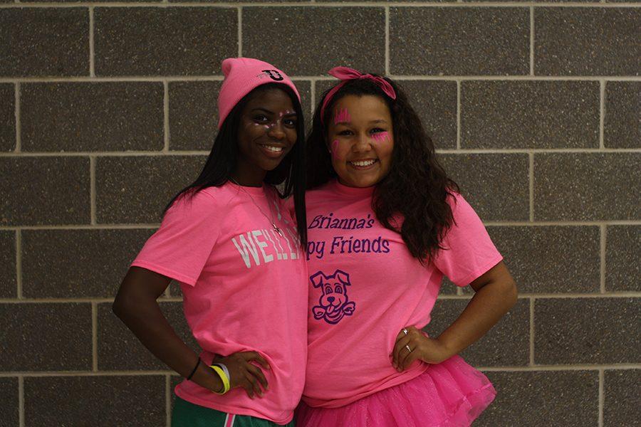 Seniors Sharmaine Harper and Nicole Haskins dress up for Pink Out to show breast cancer awareness on Tuesday, Oct. 18.