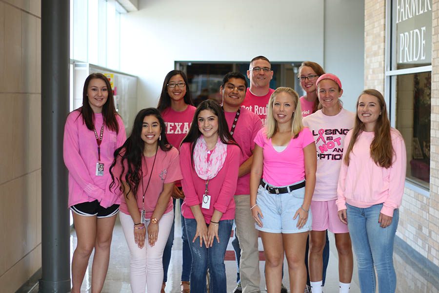 Some students from Kelly Lancasters second period class dress up for Pink Out on Tuesday, Oct. 18.