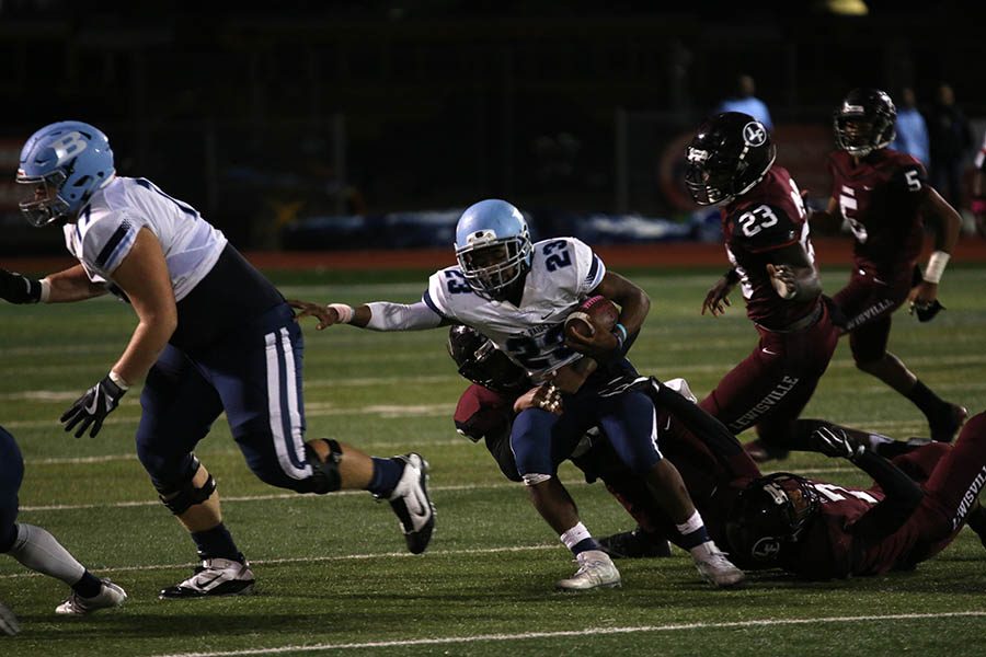 Senior line backer Ahmadric Pelican (38) gets the tackle on a L.D. Bell player.