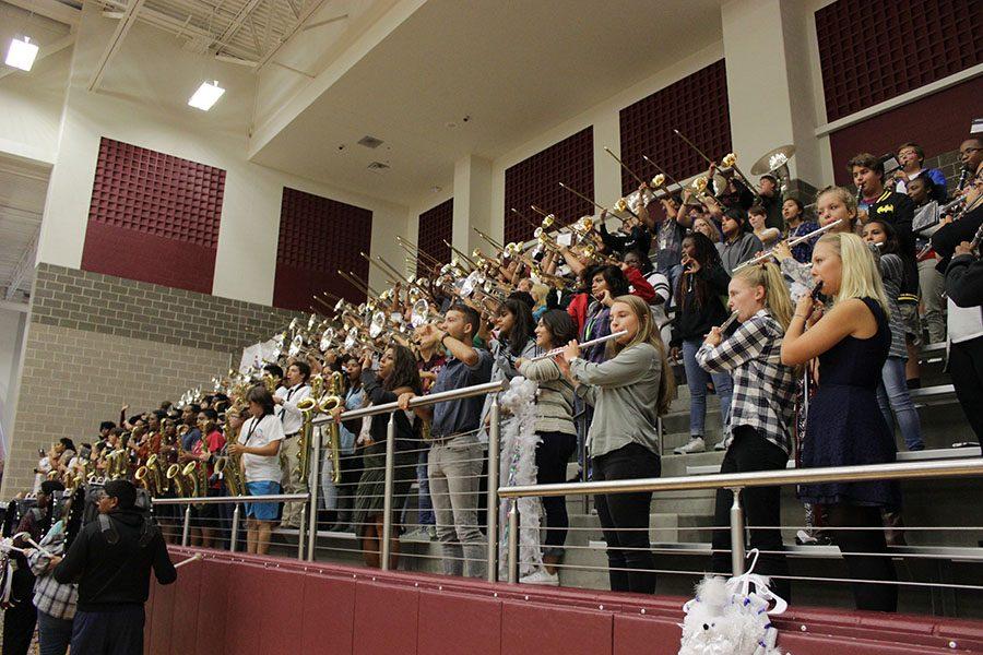 Band plays opening song as pep rally begins