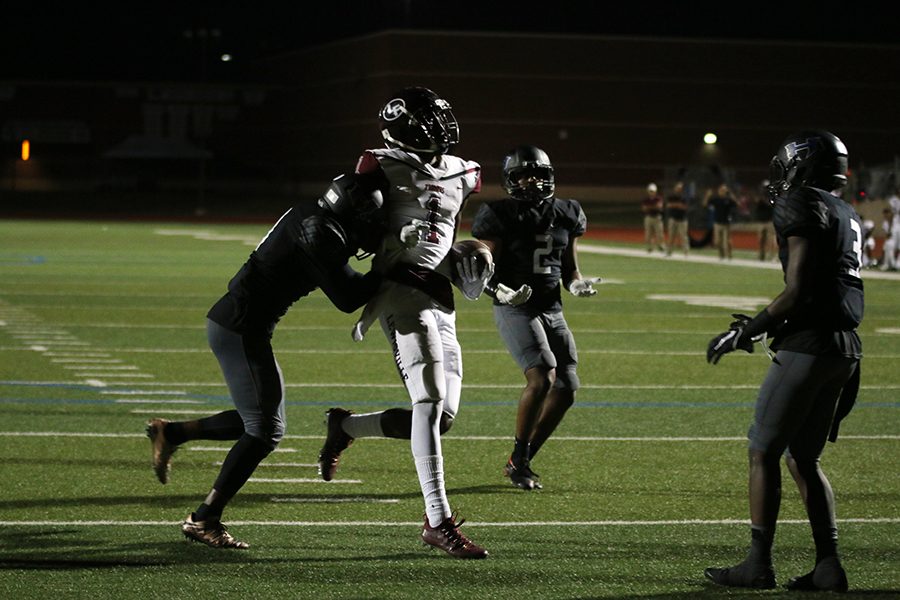Senior Tyrell Shavers (1) scores the touchdown, Hebrons player give up on stopping him.