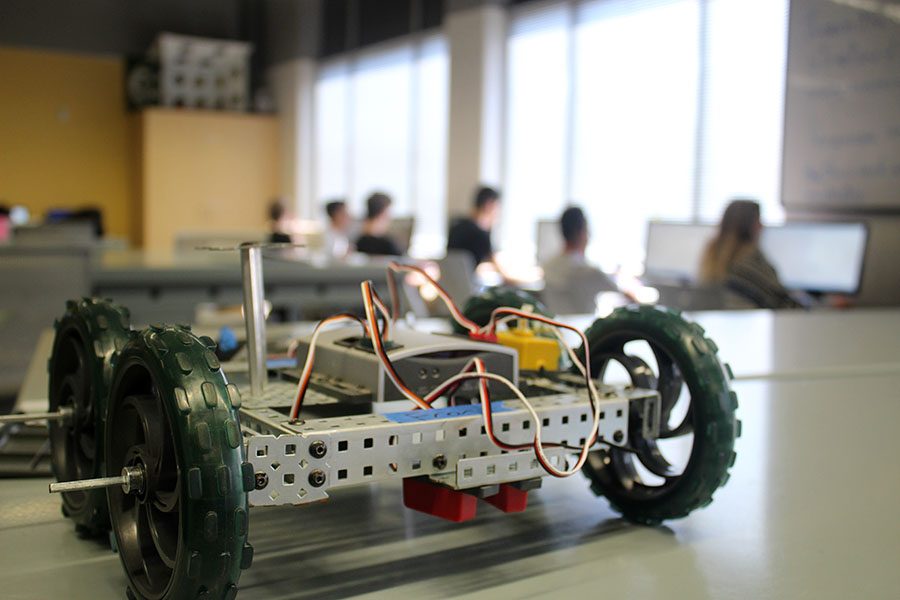 A class project made by students in robotics sits on a table to be used as an example.