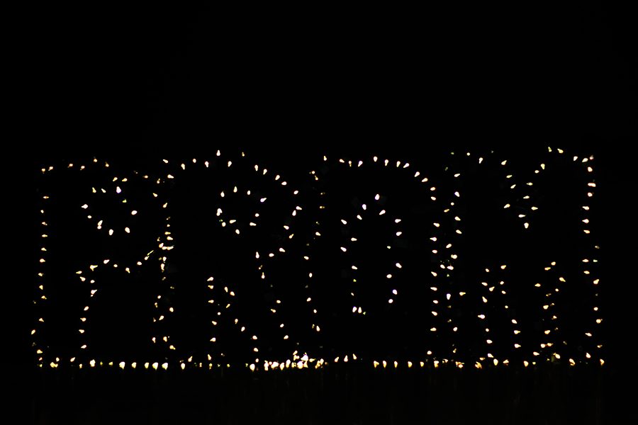 Lights light up the word PROM as part of Mondays theme reveal.