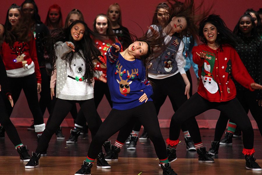 Senior captain Sydney Mooty leads the Farmerettes during their performance of Holiday Hip Hop.