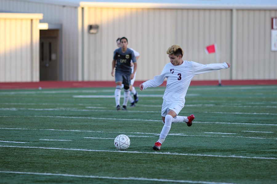 Senior Abraham Escamilla (3) takes a shot at the goal during the Keller Central game on Friday, Jan. 20.