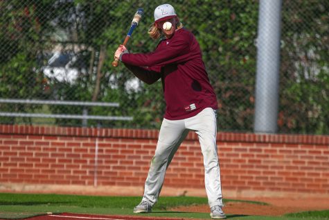 Senior Chris Giordano (16) practices batting on Thursday, Feb. 9 for the scrimmage against Colleyville Heritage on Saturday, Feb. 11.