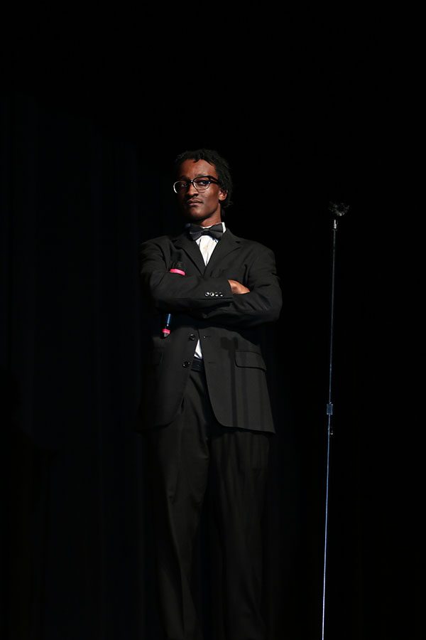 Junior Jay Teamer hosts the prom fashion show.