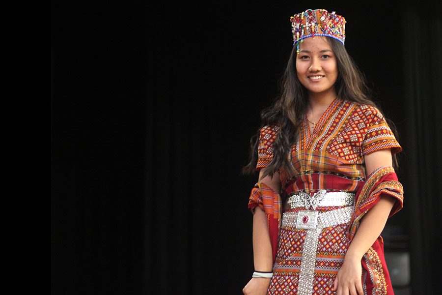 Freshman Dawt Hniang models traditional Chin clothing on Tuesday, Feb. 14 during a practice for the fashion show.