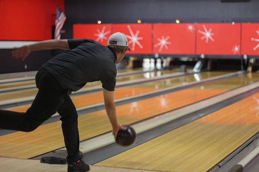 Junior Conner Mixson releases his bowing ball hoping to get a strike. 