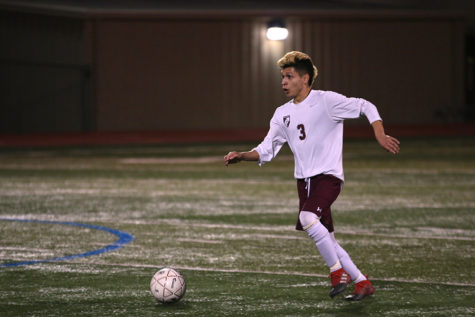 Senior varsity player Abraham Escamilla (3) looks to shoot for a goal during the Byron Nelson game on Friday, March 3.