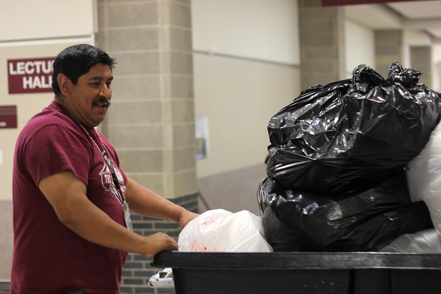 Lead custodian Joe Salas cleans up after lunch on Wednesday, April 19. 