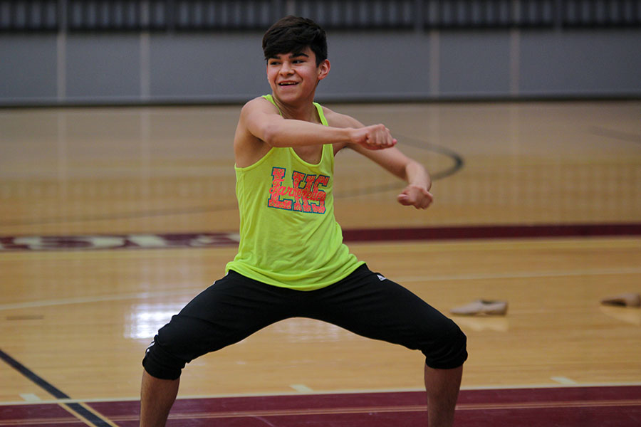 Junior George JJ Martinez enthusiastically practices a routine during practice on Friday, May 5.
