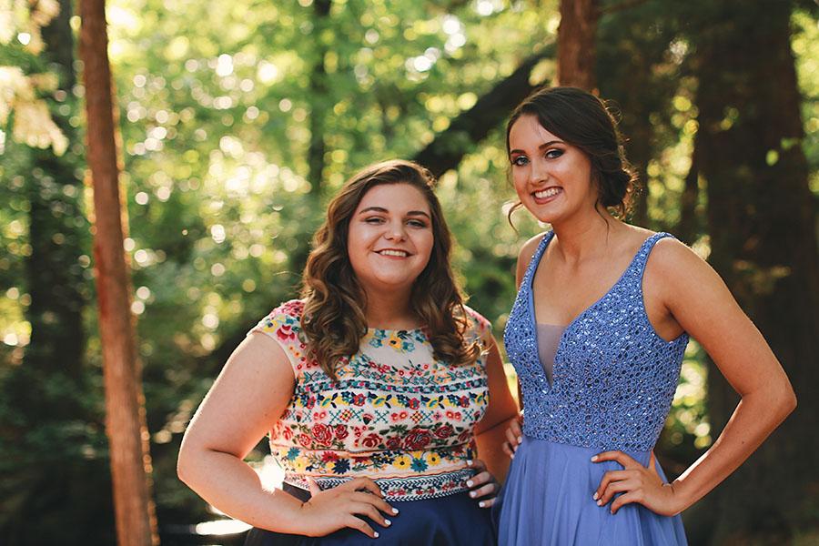 Seniors Cathleen Moutes and Tori King pose for a photo before prom. Photo courtesy of Kenneth Siscon. 