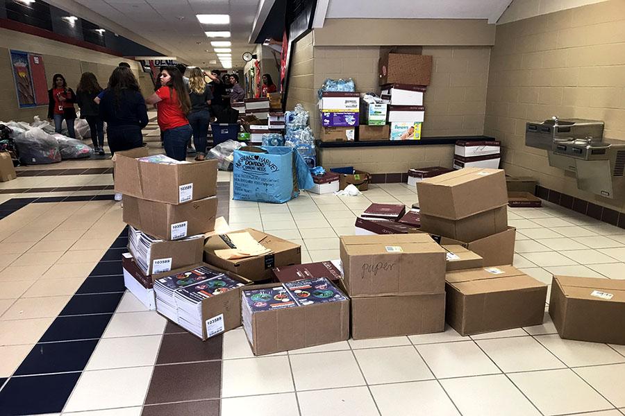 Boxes of school supplies sit in the halls at Hardin-Jefferson High School after being donated on Friday, Sept. 22. Photo courtesy of David Hernandez.