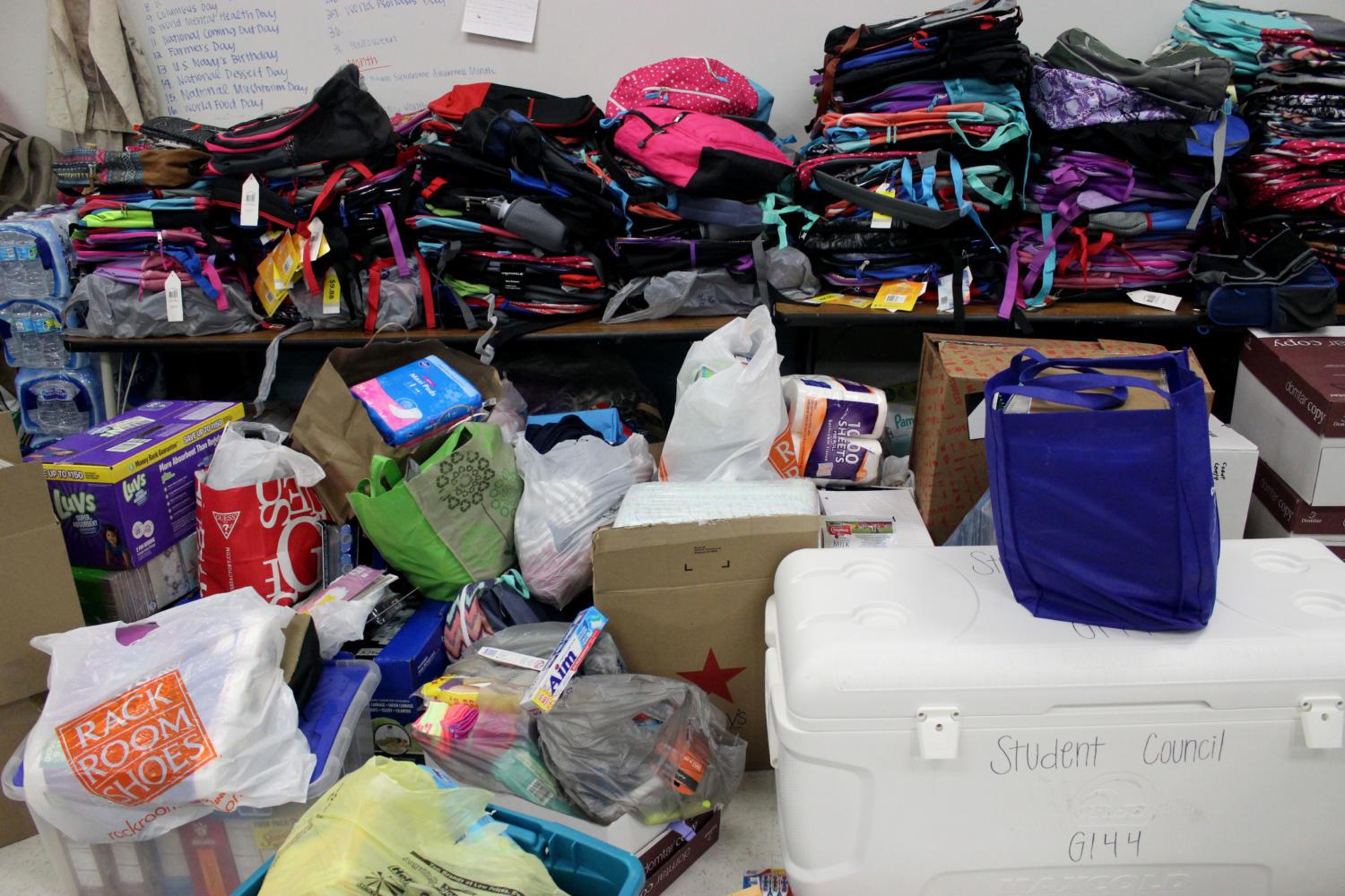Supplies+and+toiletries+that+students%2C+staff+and+faculty+have+collected+sit+in+the+StuCo+room.++