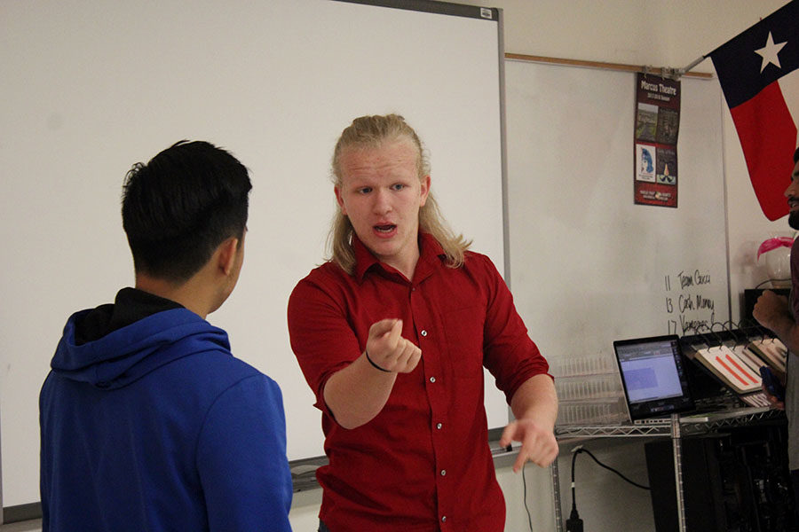 Juniors Denny Pham and Phillip Shumway act out a scene for improv club on Wednesday, Nov. 8.