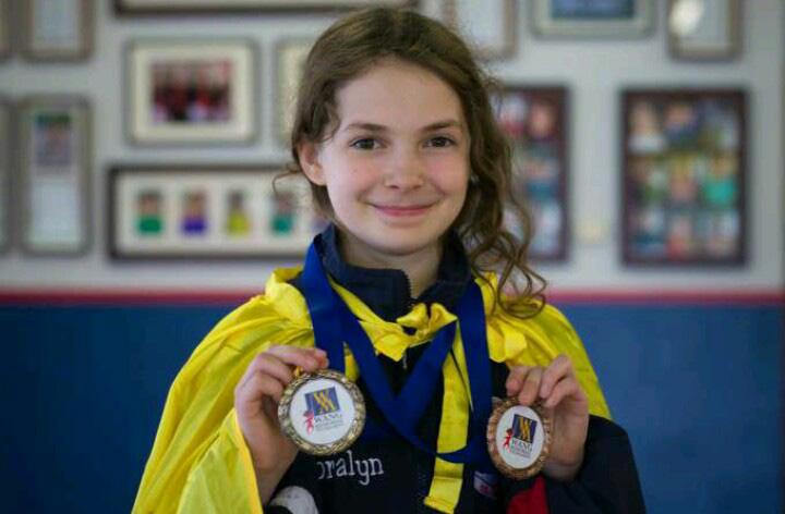 Sophomore Loralyn Sanders displays her medals. Courtesy of Loralyn Sanders.