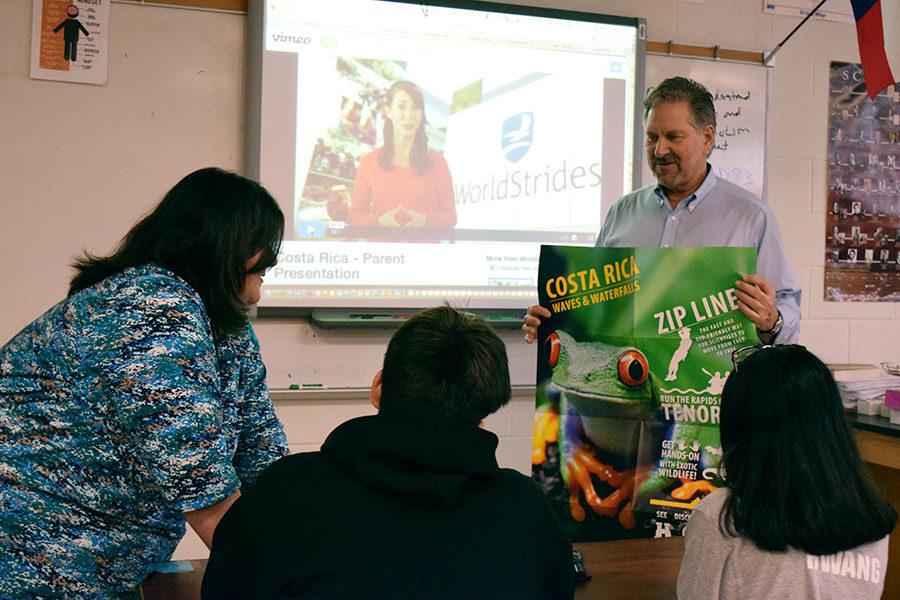 Physics teacher David Pribich speaks to students about Costa Rica during lunch on Thursday, March 1.