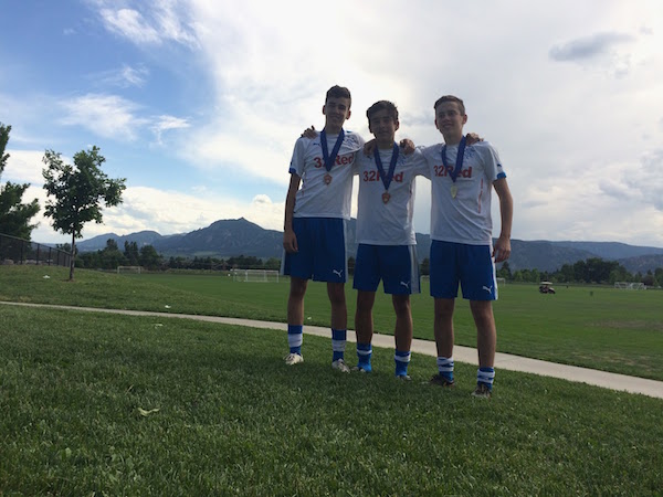 Brothers Josue, Leonel and Leonardo Romo attend a soccer tournament in Colorado before Leonardo was injured. Courtesy of Josue Romo.