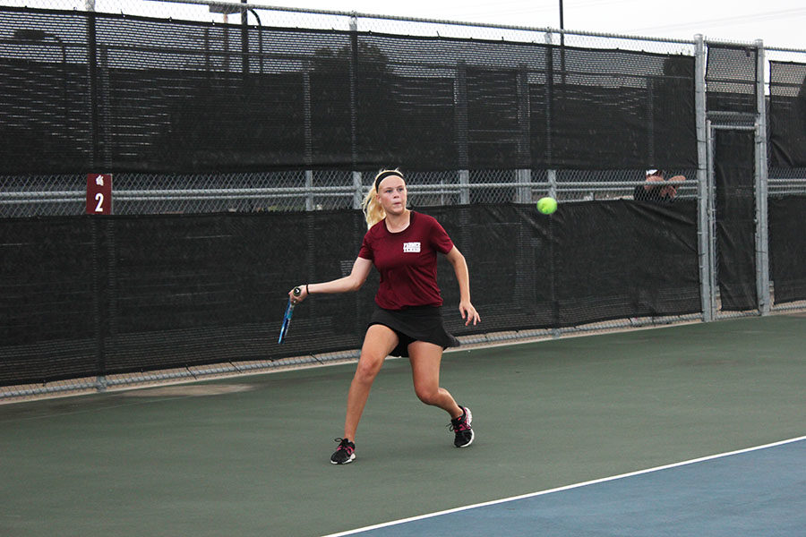 Junior Sasha Jennings sets up for a forehand during the match against Coppell on Tuesday, Sept. 11.