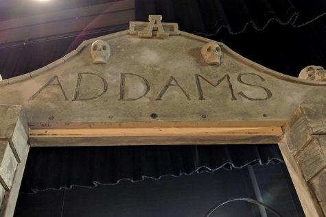The entrance to the graveyard is displayed on the auditorium stage. Courtesy of Tonya Cauduro.
