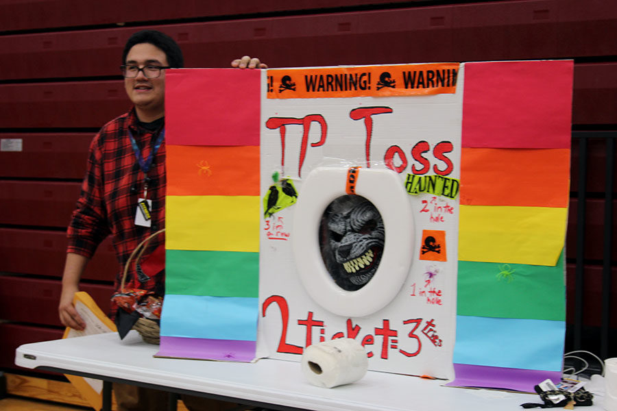 A poster is displayed for the toilet paper toss warewolf  game.